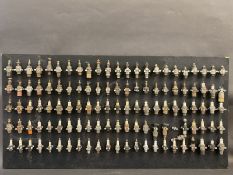 A superb collection of 96 spark plugs mounted on a display board, many rare plugs, makes include