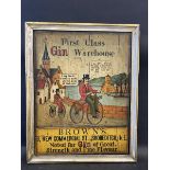 A contemporary and decorative painted wooden sign 'First Class Gin Warehouse', depicting two early