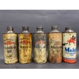 Five Mobiloil cylindrical quart cans including TT grades.