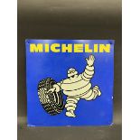 A small Michelin pictorial tin advertising sign of Mr. Bibbendum, dated 1982, 12 x 12".