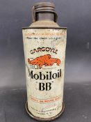 A Gargoyle Mobiloil 'BB' grade cylindrical quart can on a bulkhead bracket.