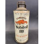 A Gargoyle Mobiloil 'BB' grade cylindrical quart can on a bulkhead bracket.