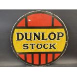 A Dunlop Stock circular double sided enamel sign, 24" diameter.