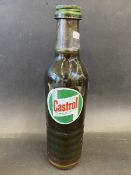 A Castrol Motor Oil quart bottle, full of oil, with Castrolite cap.