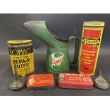 A Castrol pint measure, four repair outfit tins and two oilers.