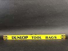 A Dunlop Tool Bags shelf strip in good condition.