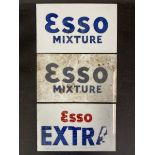 A pair of Esso Mixture milk glass petrol pump brand inserts and another for Esso Extra, each 8 1/2 x