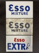 A pair of Esso Mixture milk glass petrol pump brand inserts and another for Esso Extra, each 8 1/2 x