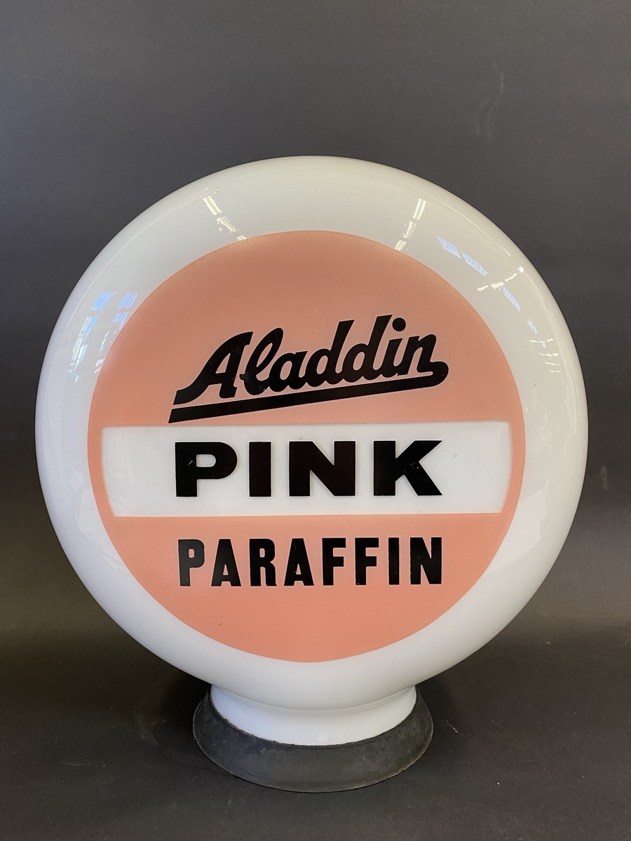 An Aladdin Pink Paraffin glass petrol pump globe by Hailware, fully stamped underneath 'Property