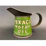 A Texaco Motor Oil pint measure with wide neck in bright condition.