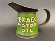 A Texaco Motor Oil pint measure with wide neck in bright condition.