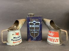 A Smiths Bluecol anti-freeze quart can, a Mobil Permazone Anti-Freeze pint measure and another for