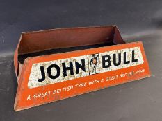 A John Bull garage forecourt tyre advertising display holder.