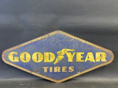 A Goodyear Tires lozenge shaped tin advertising sign, 30 x 14".
