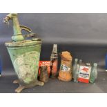 A Castrol forecourt greaser, a Vigzol half gallon measure and various oil cans, bottles etc.