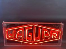 A contemporary Jaguar illuminated neon lightbox by Tunewell, 31 3/4" w x 13 1/4" h x 3" d.
