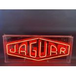 A contemporary Jaguar illuminated neon lightbox by Tunewell, 31 3/4" w x 13 1/4" h x 3" d.