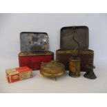 Two Primas stoves in tins, a Primas oil can, three boxed burners (2941) for Primas stoves and a