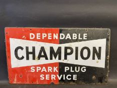 A 'Dependable Champion Spark Plug Service' rectangular enamel sign, dated 1951, 23 x 13".