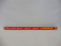 A 'More Cyclists ride on Michelin' tyres tin edge shelf strip, new old stock in near mint condition.