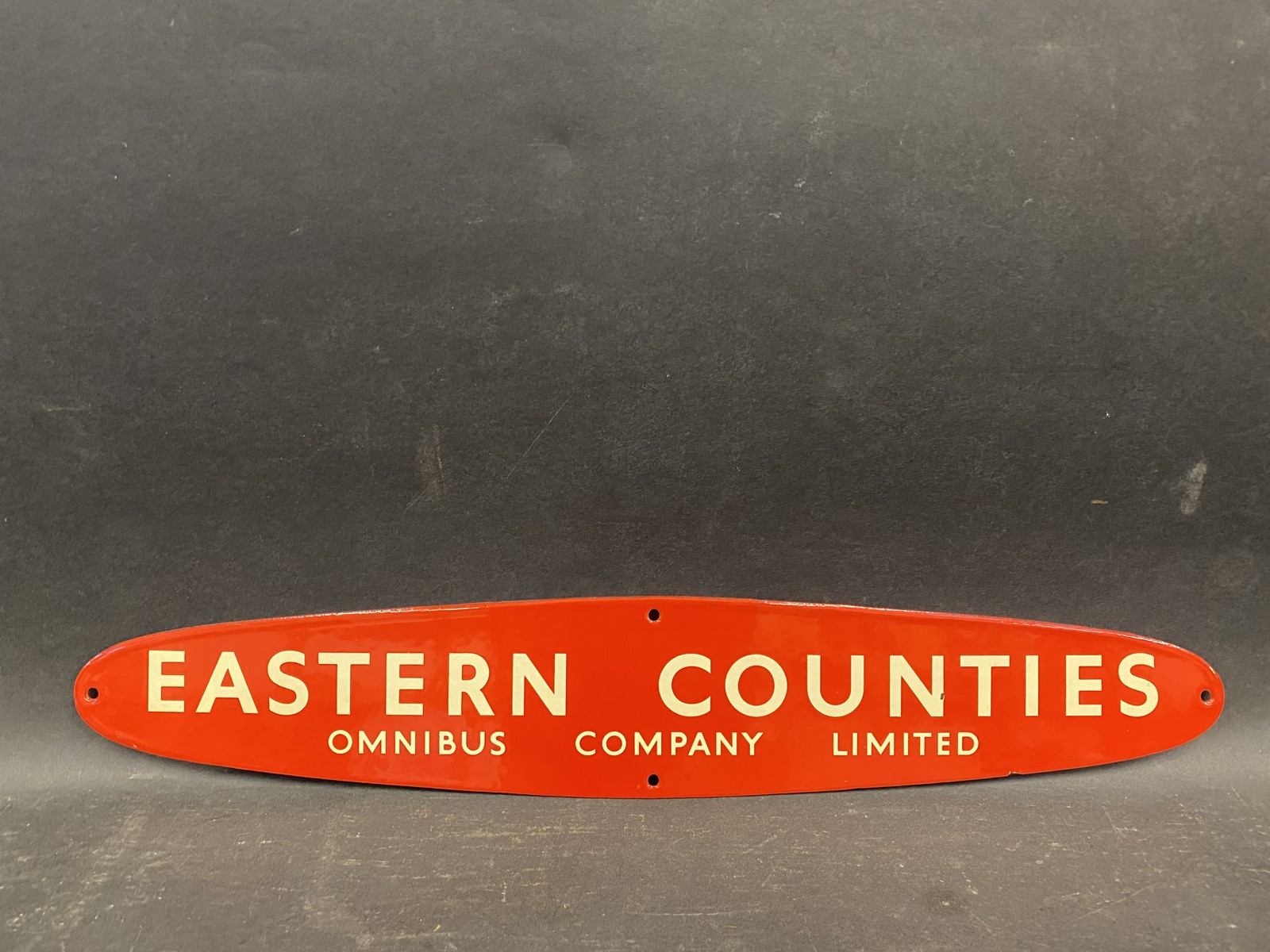 An Eastern Counties Omnibus Company Limited enamel oval header board sign, in very near mint