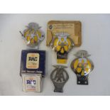A small box of AA and RAC badges including AA Suid Afrika and Singapore.