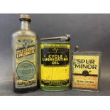 A Spur Cycle Lubricating Oil oval can, a Spur Minor Petrol light can and a Spur Cycle Cleaning &