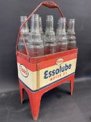 An Essolube Motor Oil eight division garage forecourt crate containing eight correct bottles, this