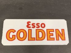 An Esso Golden glass petrol pump brand insert, 10 1/4 x 4 1/4".