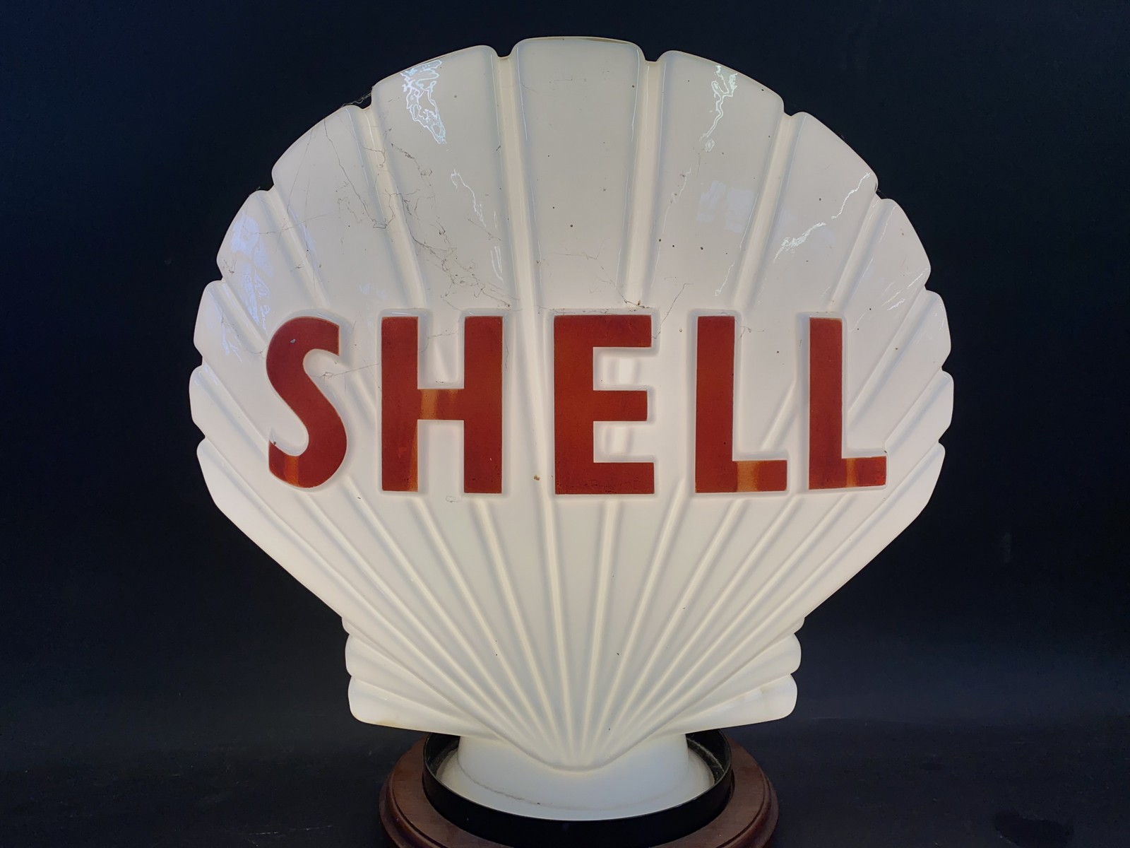 A Shell glass petrol pump globe by Hailware, fully stamped underneath 'Property of Shell-Mex & BP