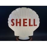 A Shell glass petrol pump globe by Hailware, fully stamped underneath 'Property of Shell-Mex & BP