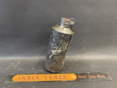 An India Tyres shelf strip and a Filtrate quart can on bulkhead bracket.