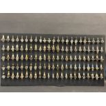 A superb collection of 96 spark plugs mounted on a display board including many rare plugs small