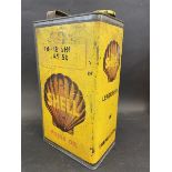 A Shell Motor Oil 'Triple Shell' grade gallon can.