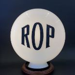An early ROP pill shaped glass petrol pump globe, marked to the base 'Foreign'.