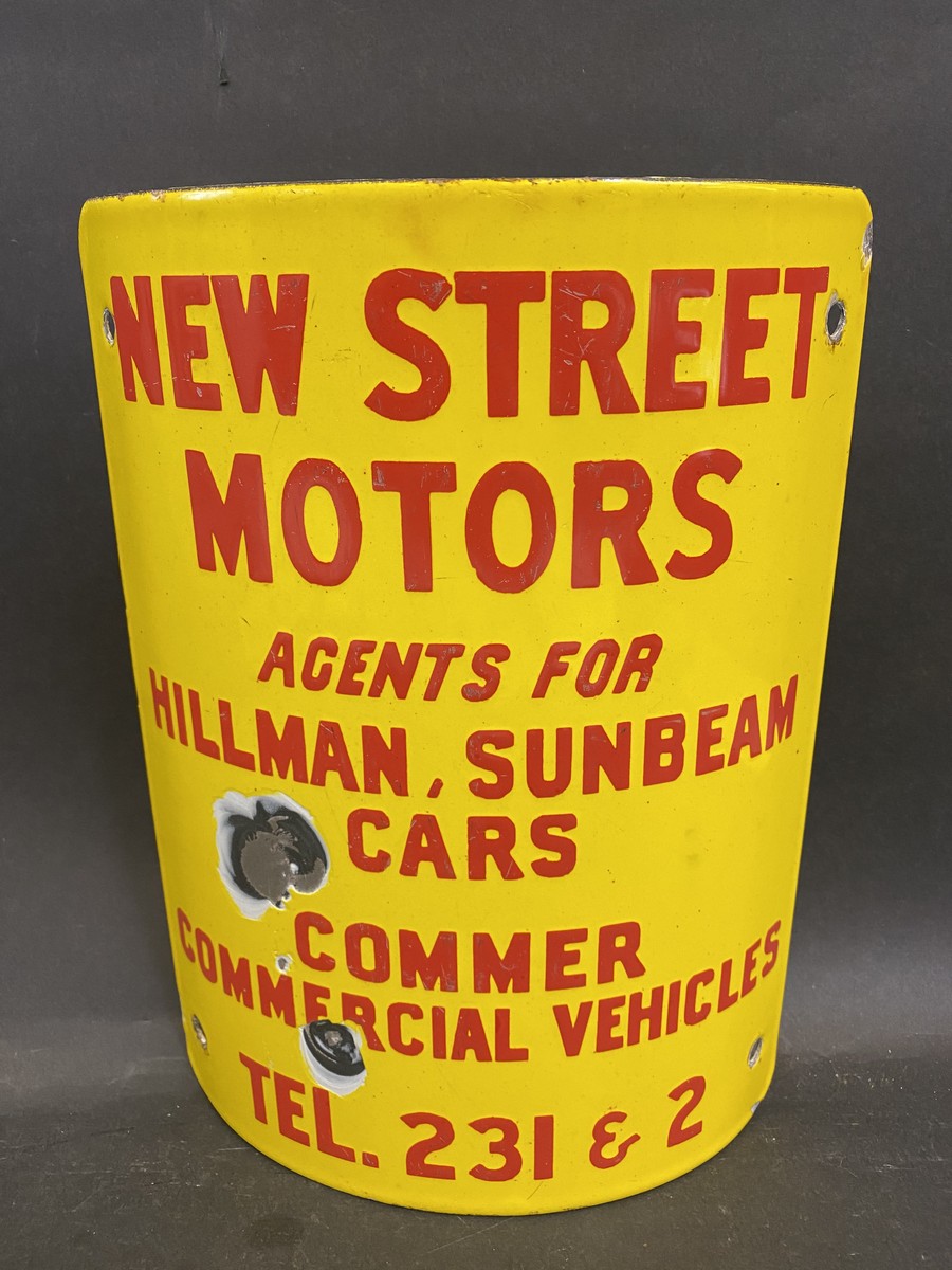 A curved enamel sign for a post or similar advertising 'New Street Motors' agents for Hillman,