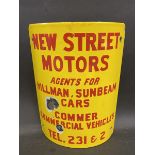 A curved enamel sign for a post or similar advertising 'New Street Motors' agents for Hillman,