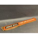 A John Bull Tyres and Accessories shelf strip appears to be new old stock, still in grease proof