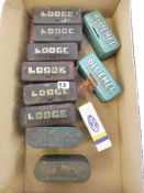 Ten spark plug tins with contents including Bluemel and one empty Bluemel tin.