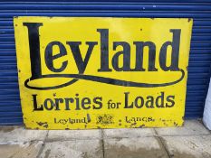 A large Leyland 'Lorries for Loads' rectangular enamel sign, of Leyland Lancs with central coat of