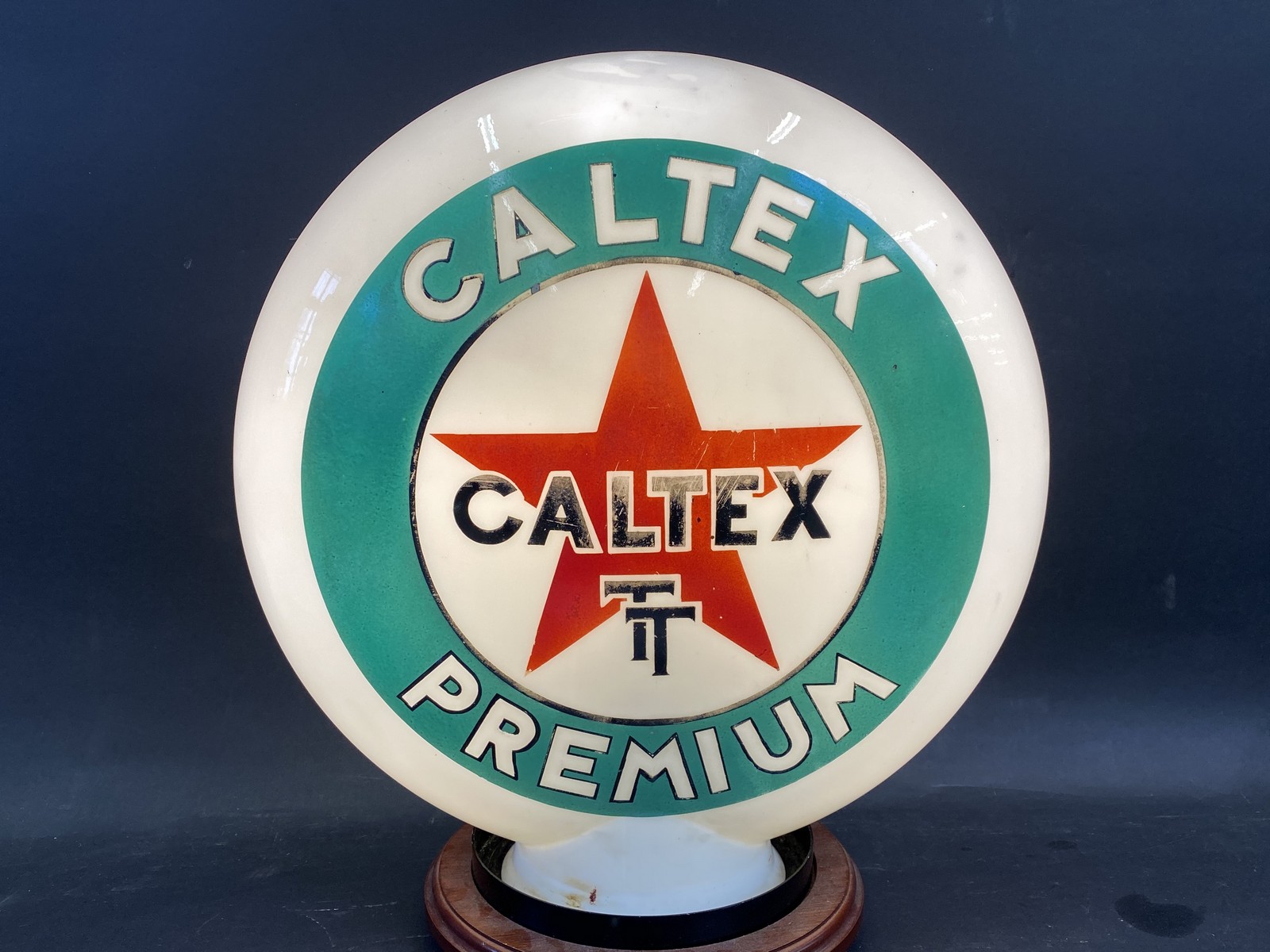 A Caltex TT Premium glass petrol pump globe by Webb's Crystal, chips to neck. - Image 2 of 3