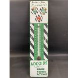 A Duckham's Adcoids black and white enamel thermometer, in excellent condition, 11 x 45 1/4".