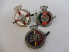 Three good quality enamel car badges by Gaunt, Royal Tank Regiment, Westminster Dragoons and a third