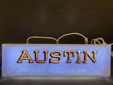 An Austin illuminated showroom sign in blue perspex with orange letters, some damage to the