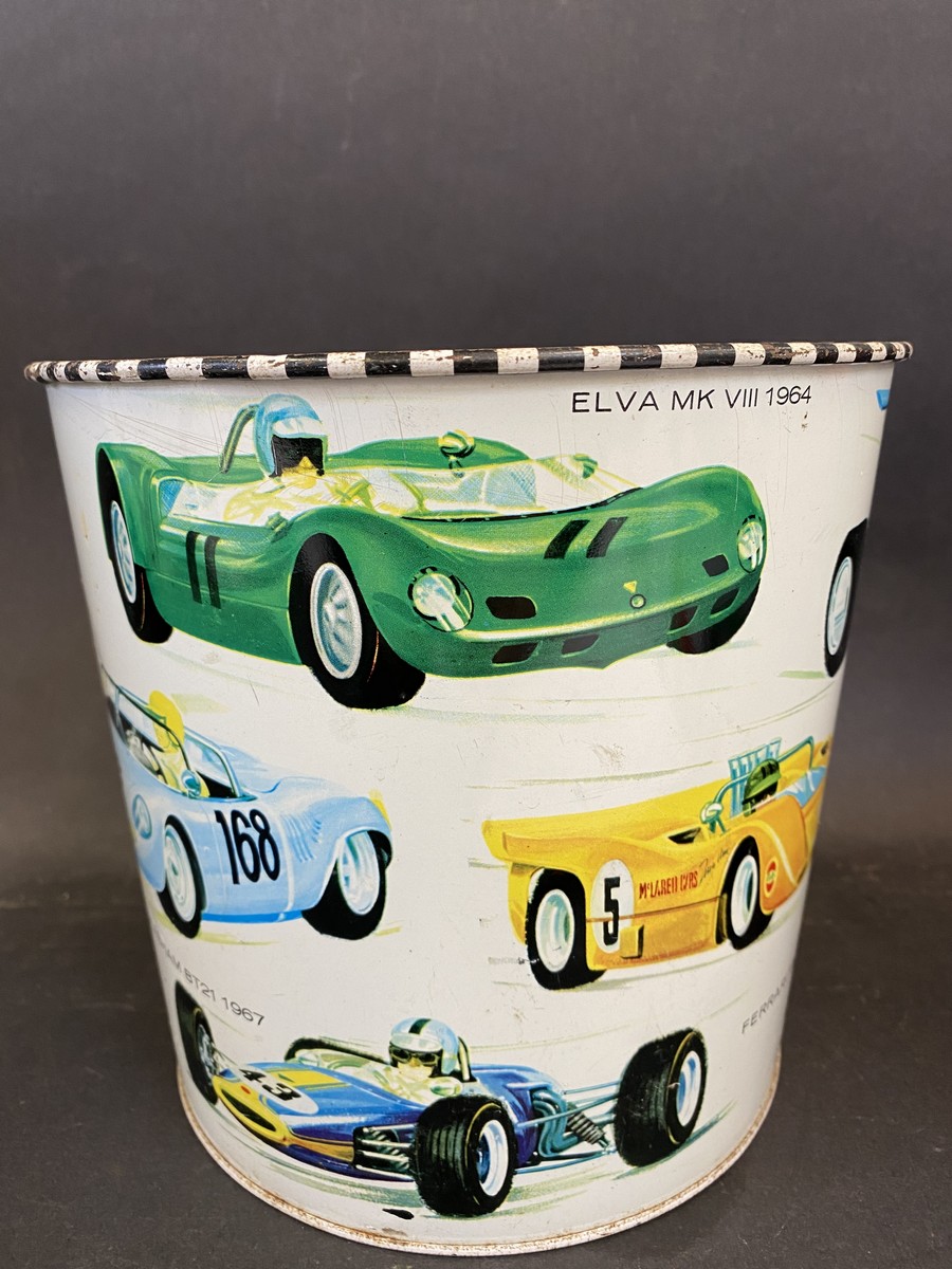 A waste paper bin decorated with Formula 1 race cars from the 1960s, 7" high. - Image 2 of 4