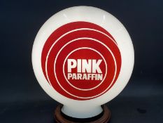 A Pink Paraffin pill shaped glass petrol pump globe by Hailware, fully stamped 'Pink is a joint