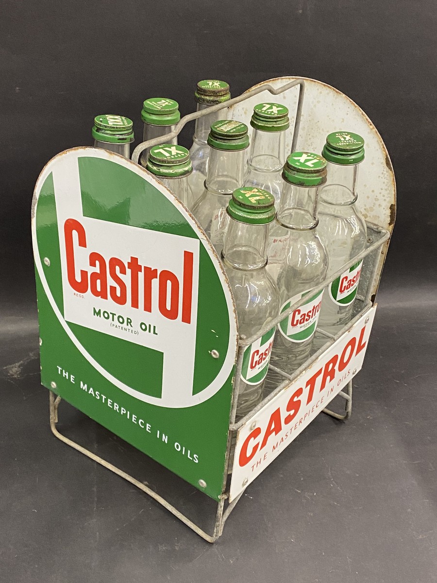 A good Castrol nine division garage forecourt oil bottle rack with enamel signs all round and nine - Image 3 of 3