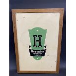 A Hercules double sided tin advertising sign mounted in a light oak easel frame, 11 1/2 x 16 1/2".