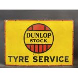 A Dunlop Stock rectangular enamel sign in good condition, 30 x 20".