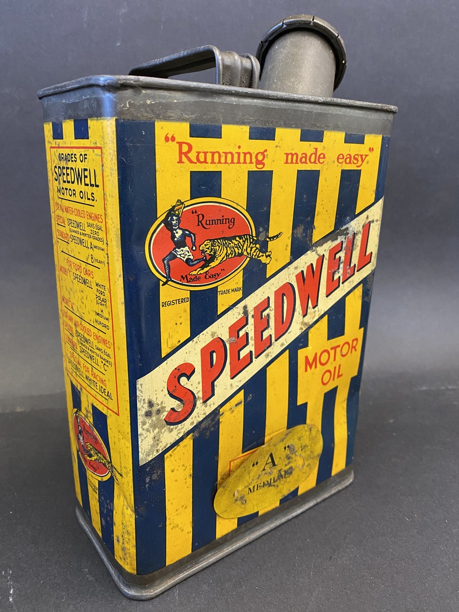 A Speedwell Motor Oil half gallon can of bright colour.